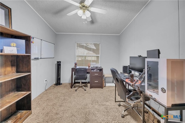 office area featuring ornamental molding, light carpet, ceiling fan, and a textured ceiling