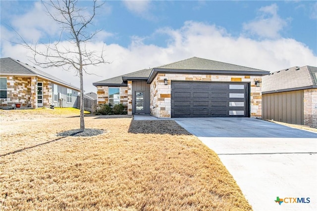 view of front of home with a garage