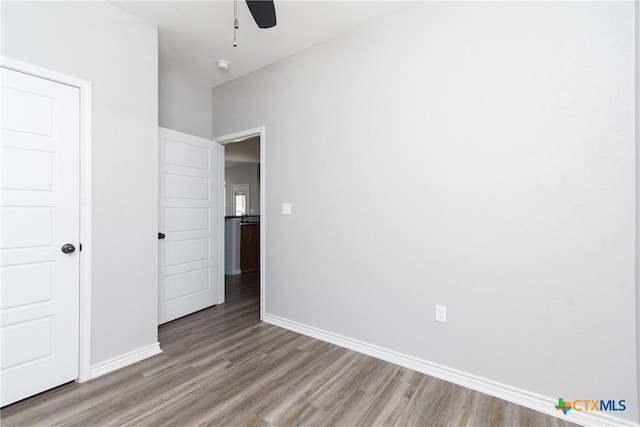 unfurnished bedroom with light hardwood / wood-style flooring and ceiling fan