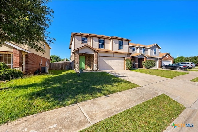 3410 Regency Ct, Killeen, TX 76549 - view of front of home featuring concrete driveway, an attached garage, and cooling unit