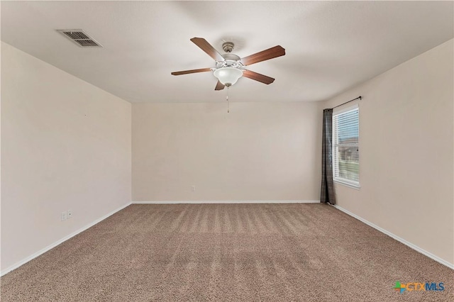 111 Sheep Trail Dr, Kyle, TX 78640 - carpeted spare room with visible vents, ceiling fan, and baseboards