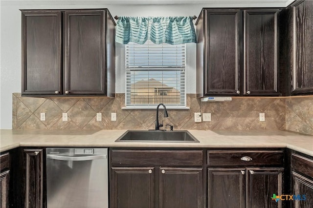 111 Sheep Trail Dr, Kyle, TX 78640 - kitchen with light countertops, dark brown cabinetry, stainless steel dishwasher, and a sink