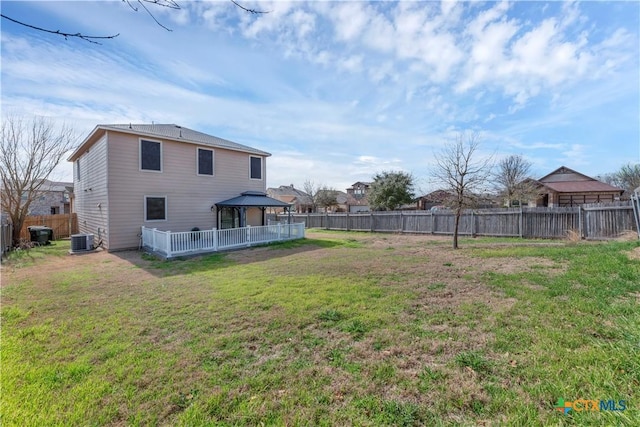 111 Sheep Trail Dr, Kyle, TX 78640 - view of yard featuring a gazebo, a fenced backyard, and central AC unit