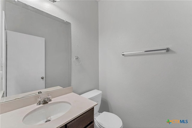 111 Sheep Trail Dr, Kyle, TX 78640 - bathroom with toilet and vanity