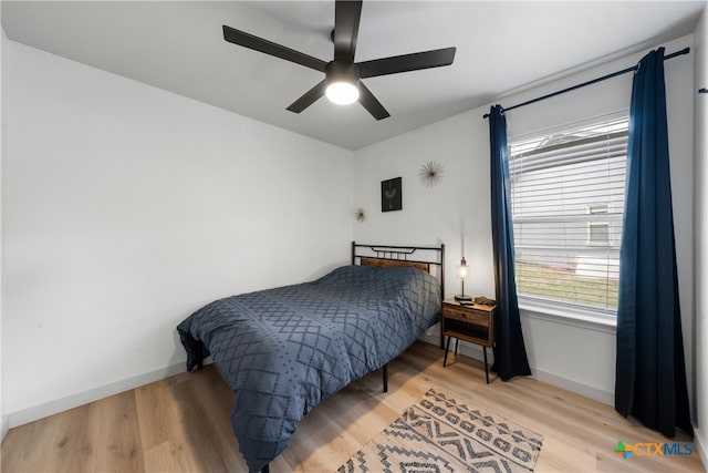 4810 Stone Pointe Dr, Temple, TX 76502 - bedroom featuring light wood-style flooring and ceiling fan