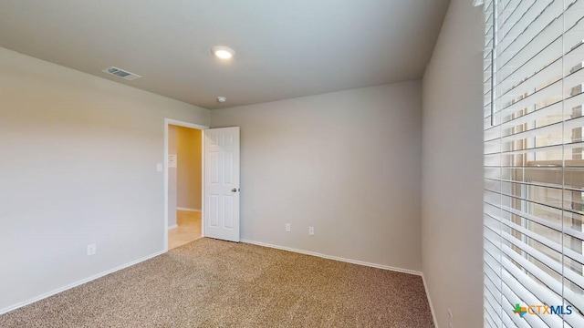 view of carpeted spare room