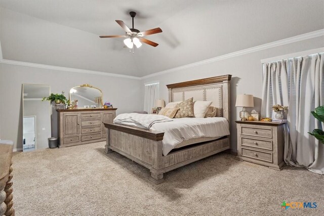 bedroom featuring light carpet, lofted ceiling, a ceiling fan, and ornamental molding