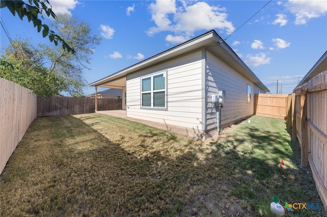 view of property exterior with a yard