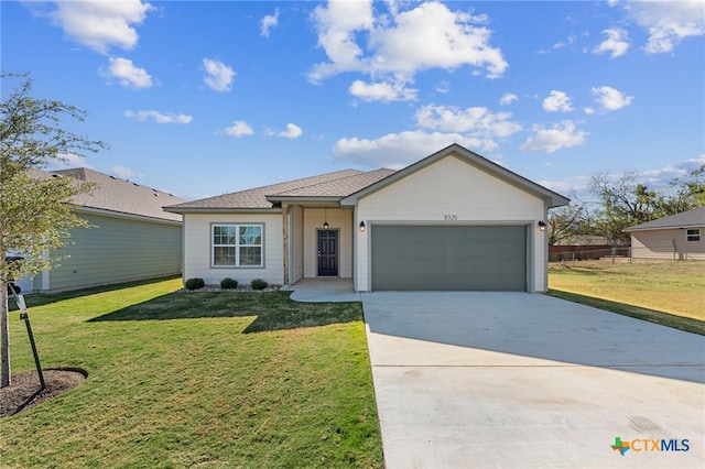 single story home with a garage and a front yard