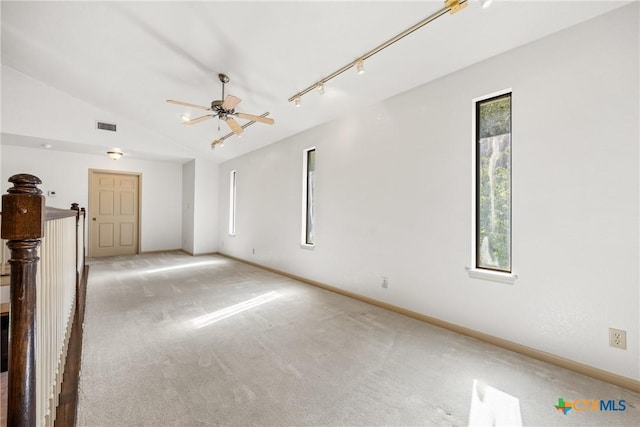 3614 Quail Hollow Rd, Harker Heights, TX 76548 - spare room with light colored carpet, vaulted ceiling, and ceiling fan