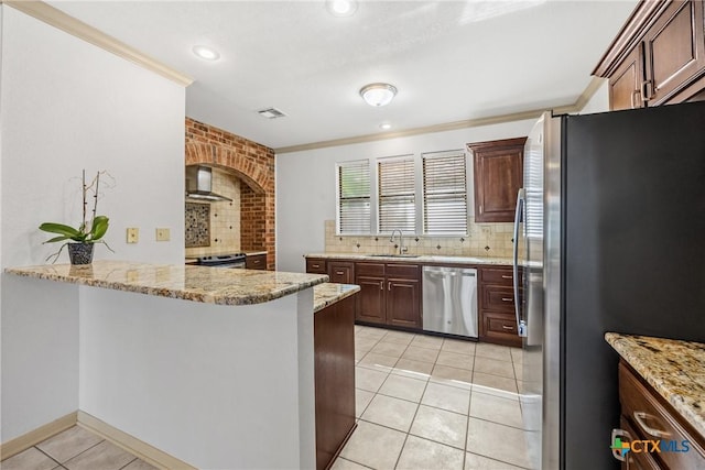3614 Quail Hollow Rd, Harker Heights, TX 76548 - kitchen featuring stainless steel appliances, range hood, decorative backsplash, light tile patterned floors, and a peninsula