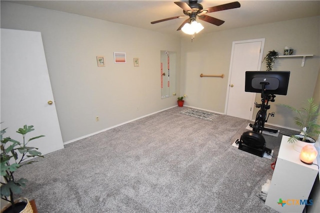 exercise area with carpet and a ceiling fan