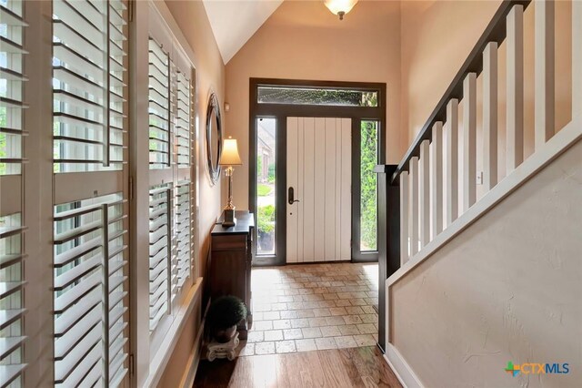 6 Cotswold Ln, Victoria, TX 77904 - foyer with lofted ceiling and wood finished floors