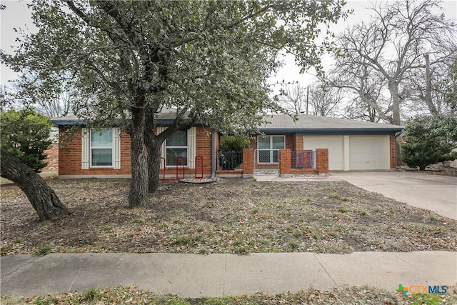 ranch-style home with a garage