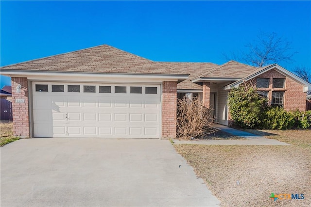 single story home with a garage