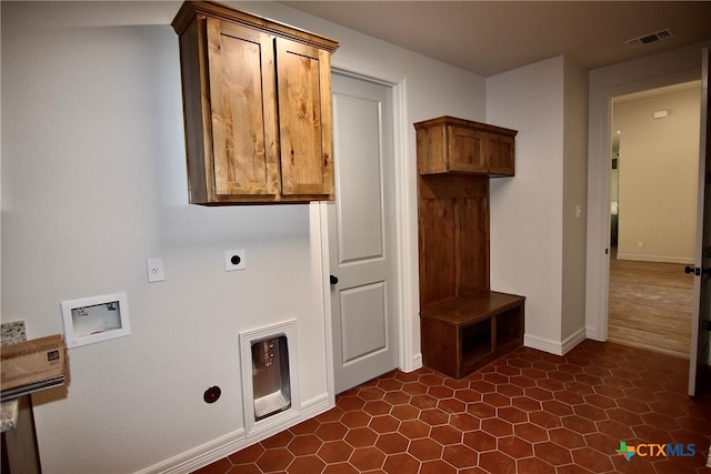 laundry area with hookup for a washing machine, cabinets, and hookup for an electric dryer