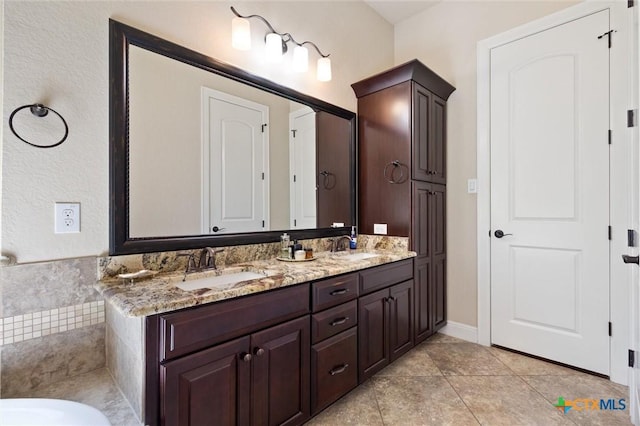 1919 Los Santos Dr, San Marcos, TX 78666 - bathroom featuring a sink and double vanity
