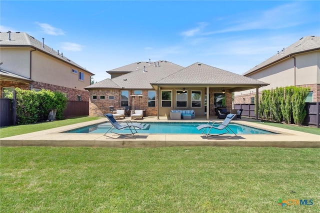 1919 Los Santos Dr, San Marcos, TX 78666 - view of pool featuring a fenced backyard, a fenced in pool, a patio area, and a lawn