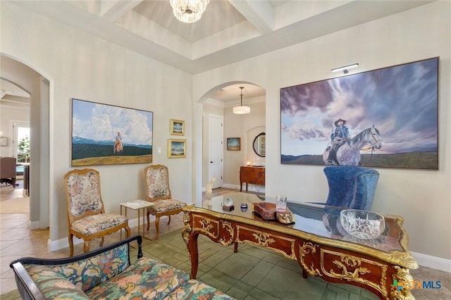 1919 Los Santos Dr, San Marcos, TX 78666 - sitting room featuring tile patterned floors, arched walkways, coffered ceiling, and baseboards