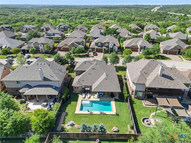 1919 Los Santos Dr, San Marcos, TX 78666 - aerial view featuring a view of trees and a residential view