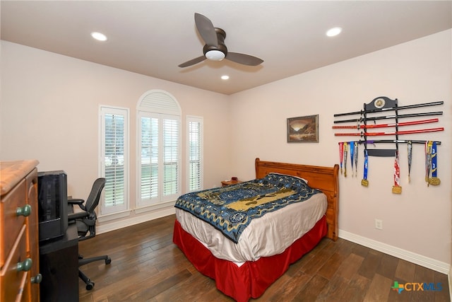 bedroom featuring dark wood-type flooring and ceiling fan