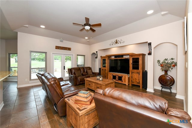 living room featuring lofted ceiling, ceiling fan, and french doors