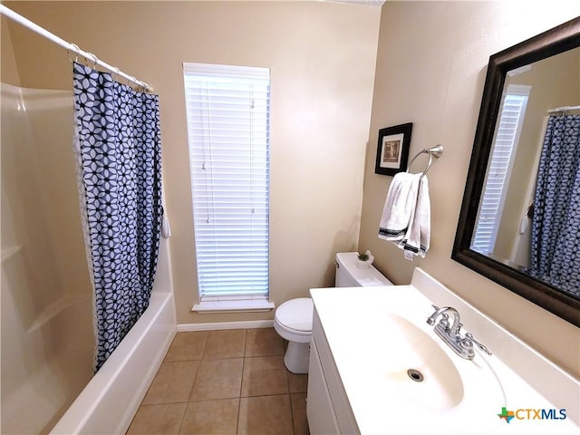 full bathroom with tile patterned floors, vanity, shower / bath combo, and toilet