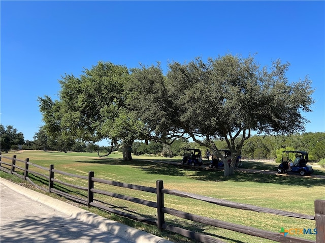 view of yard with a rural view