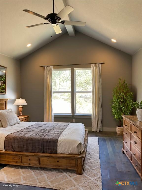 bedroom with vaulted ceiling with beams, ceiling fan, baseboards, and wood finished floors