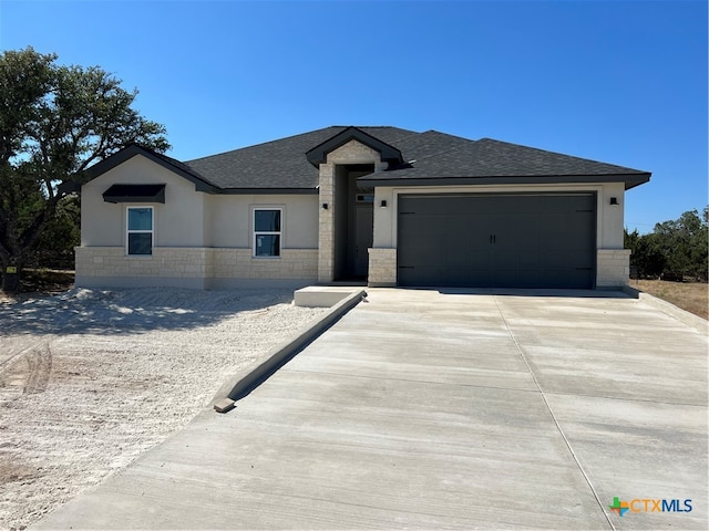 view of front of home with a garage