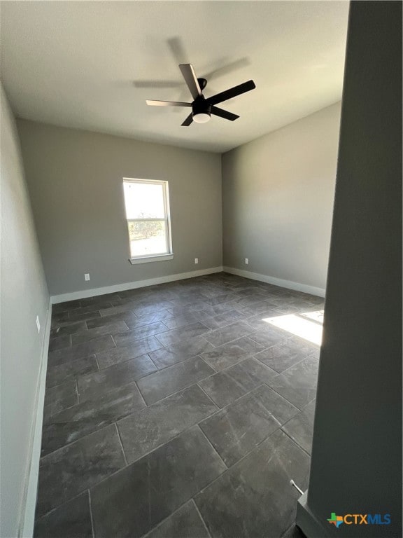 unfurnished room featuring ceiling fan