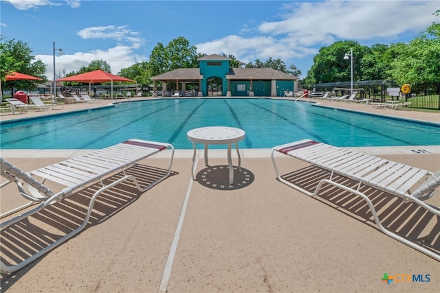 view of pool with a patio