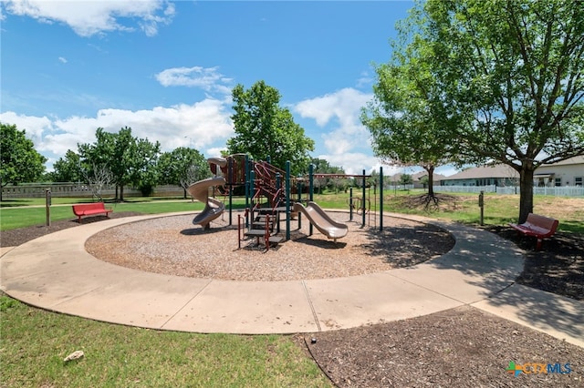 view of jungle gym featuring a yard