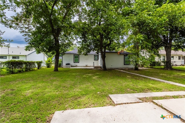 exterior space featuring a front yard