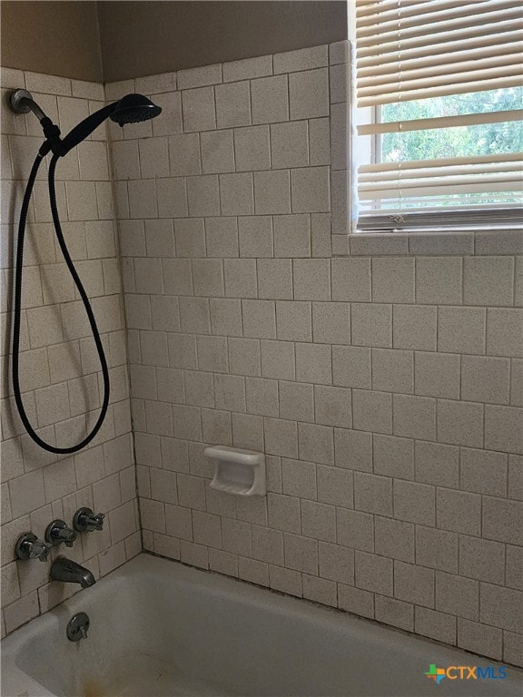 full bathroom with  shower combination and radiator heating unit