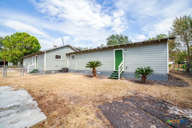 back of property with cooling unit