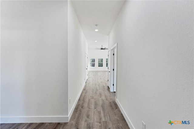 hall with light hardwood / wood-style floors