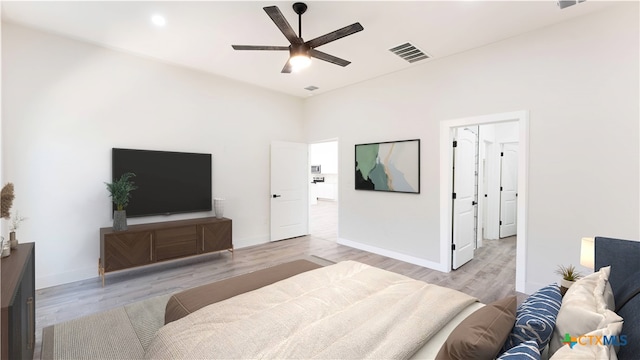 bedroom featuring ceiling fan and light hardwood / wood-style floors