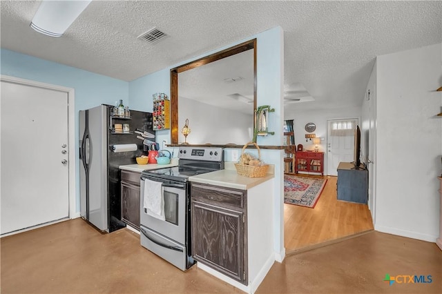 kitchen with a textured ceiling, visible vents, concrete floors, appliances with stainless steel finishes, and dark brown cabinetry