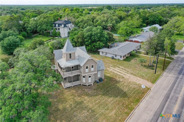 bird's eye view featuring a forest view