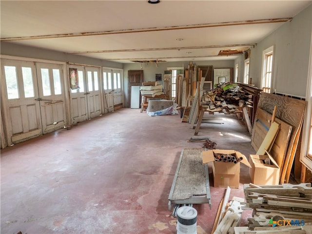 misc room with concrete floors