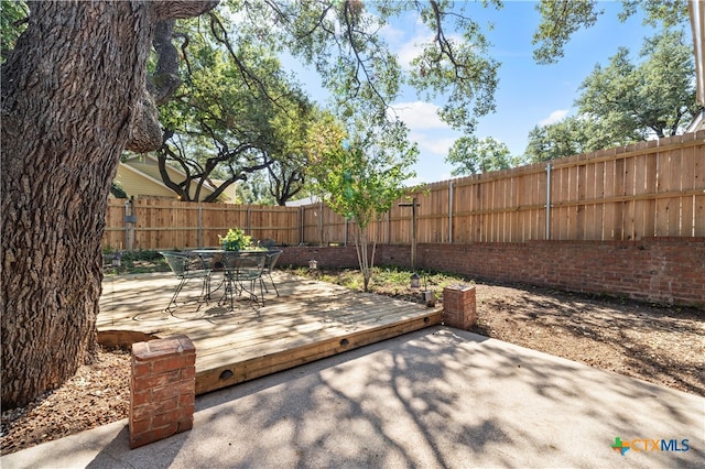 view of patio featuring a deck