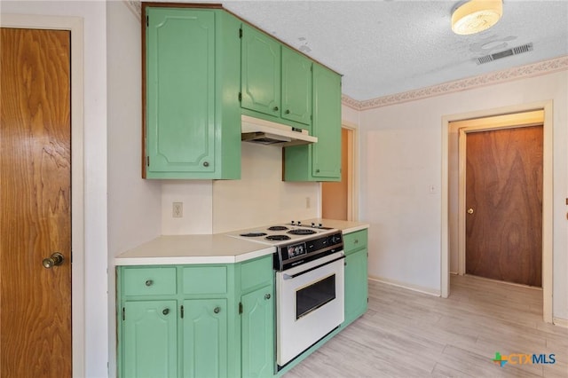 kitchen featuring electric range, a textured ceiling, and light wood-type flooring