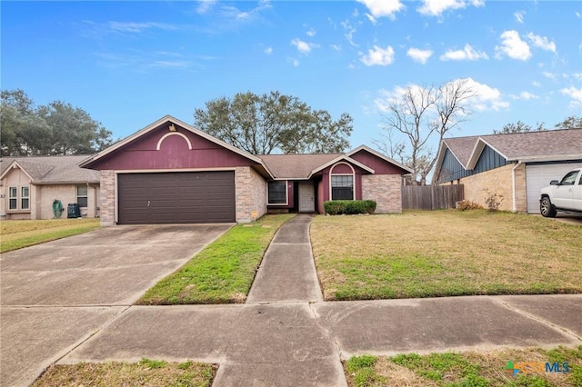 ranch-style house with a garage and a front lawn