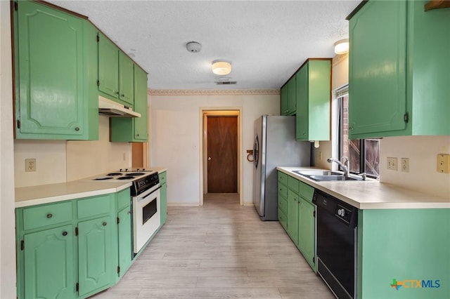 kitchen with stainless steel refrigerator, white electric stove, black dishwasher, sink, and a textured ceiling