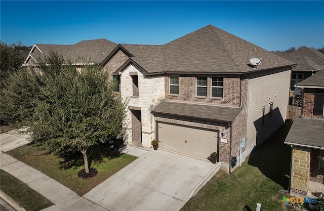 french provincial home featuring a garage