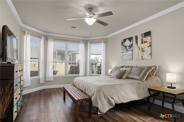 bedroom featuring multiple windows, ceiling fan, dark hardwood / wood-style floors, and ornamental molding