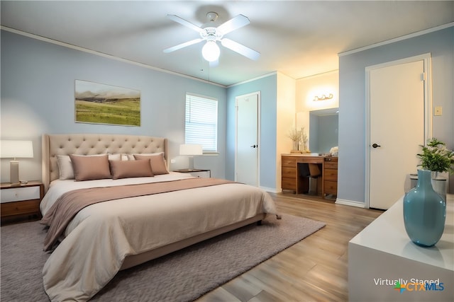 bedroom with ornamental molding, ceiling fan, and light hardwood / wood-style floors