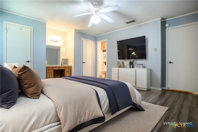 bedroom featuring ceiling fan, crown molding, dark hardwood / wood-style floors, and ensuite bath