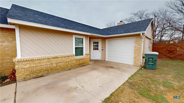 exterior space with a garage